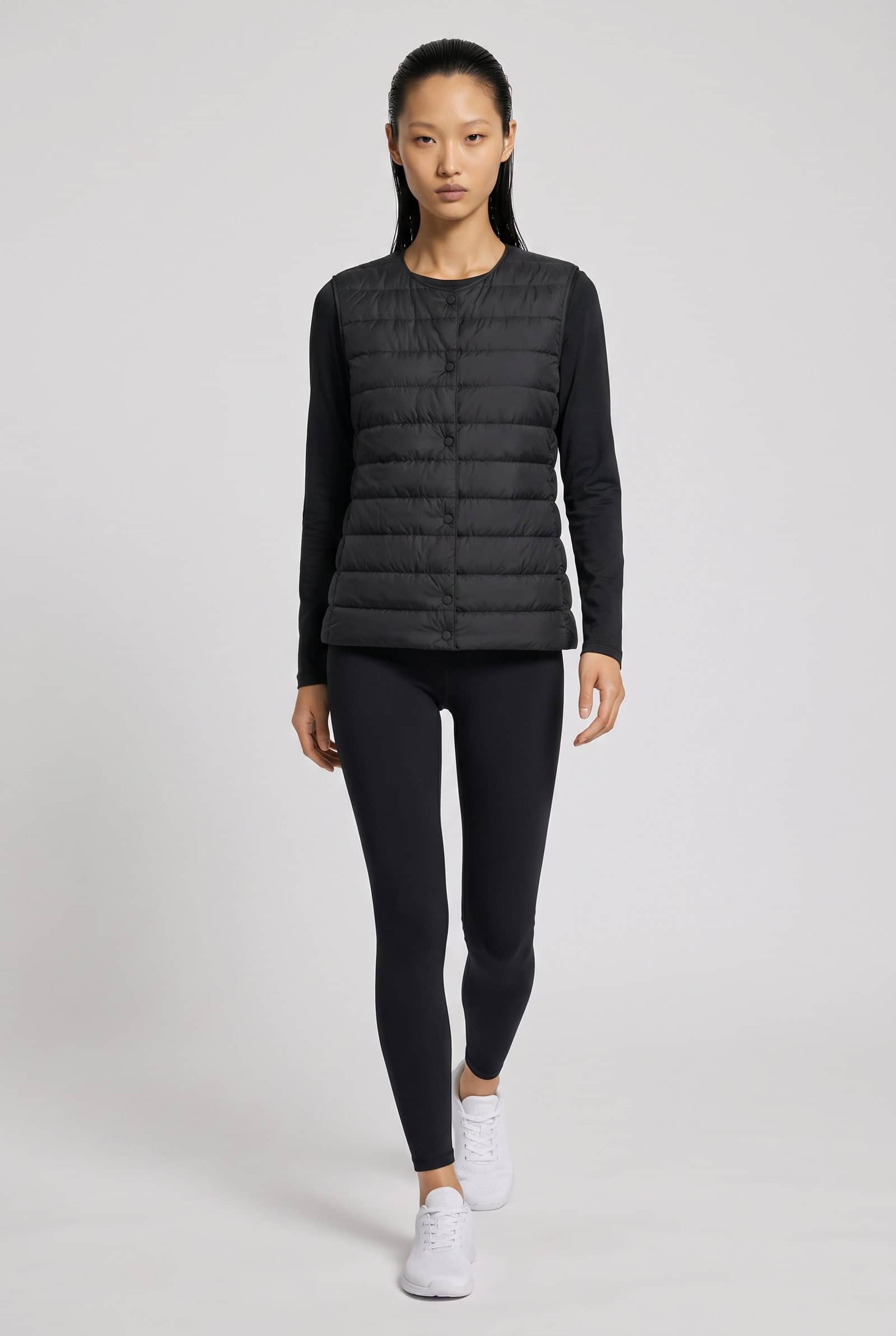 Black sleek quilted vest